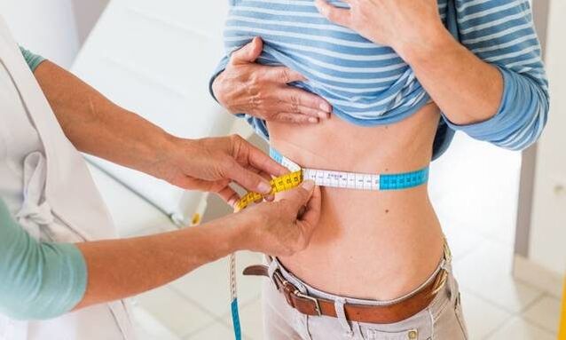 vermindering van de taille van het meisje in een week